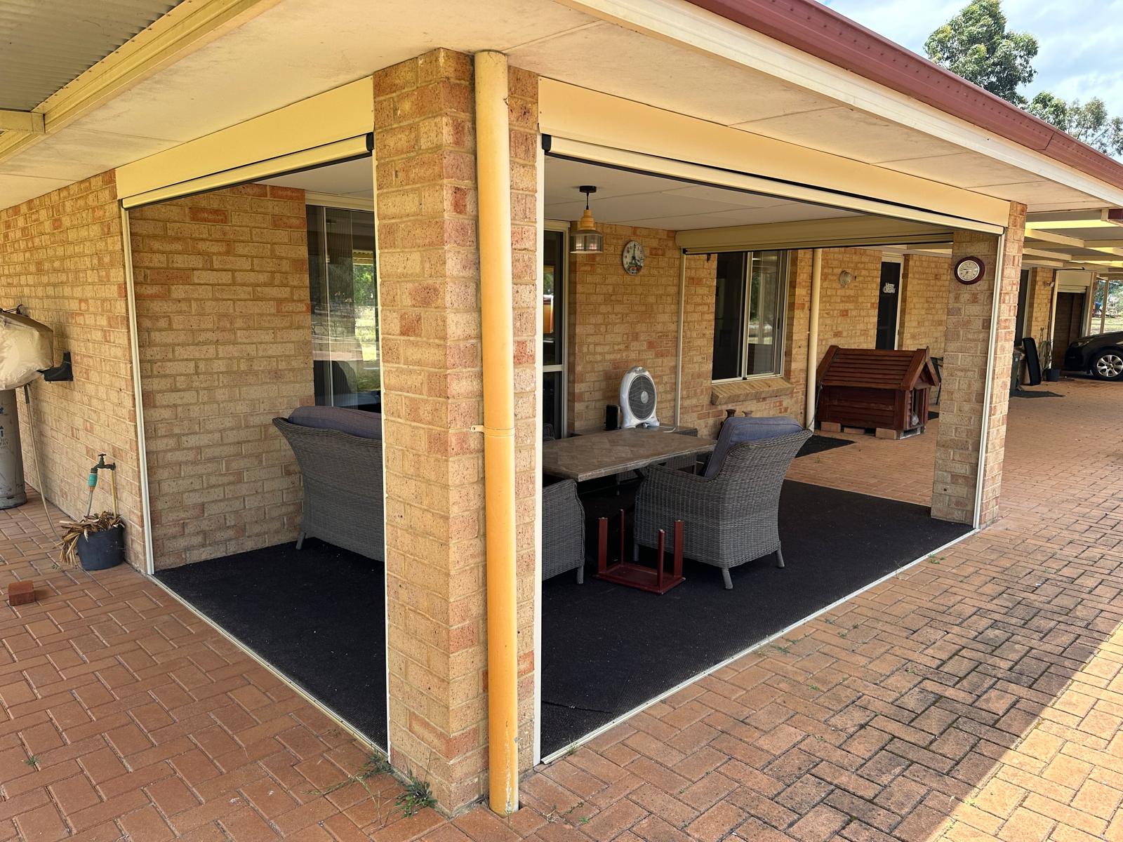 Perth alfresco with clear blinds - roller shutters manual vs electric also protect outdoor living spaces